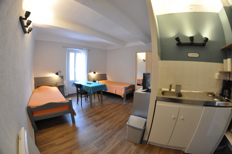 Espace cuisine et lits